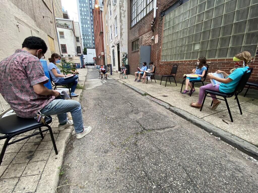 3rd and 4th graders doing tefilah outside