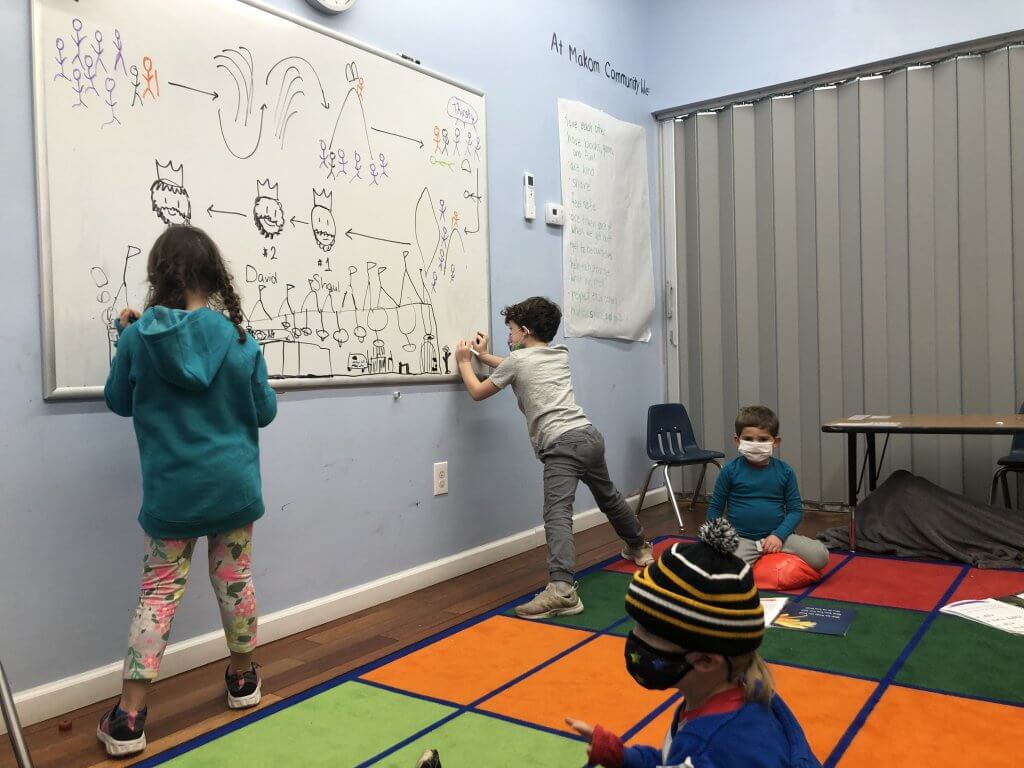 K student and 1st grader illustrate the scene of Shlomo dreaming about talking to God.